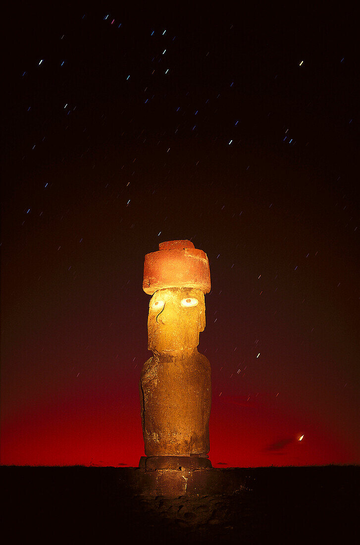 Illuminated statue in the evening, Moai Ko Te Rilku, Tahai, Easter Island, Chile, South America, America