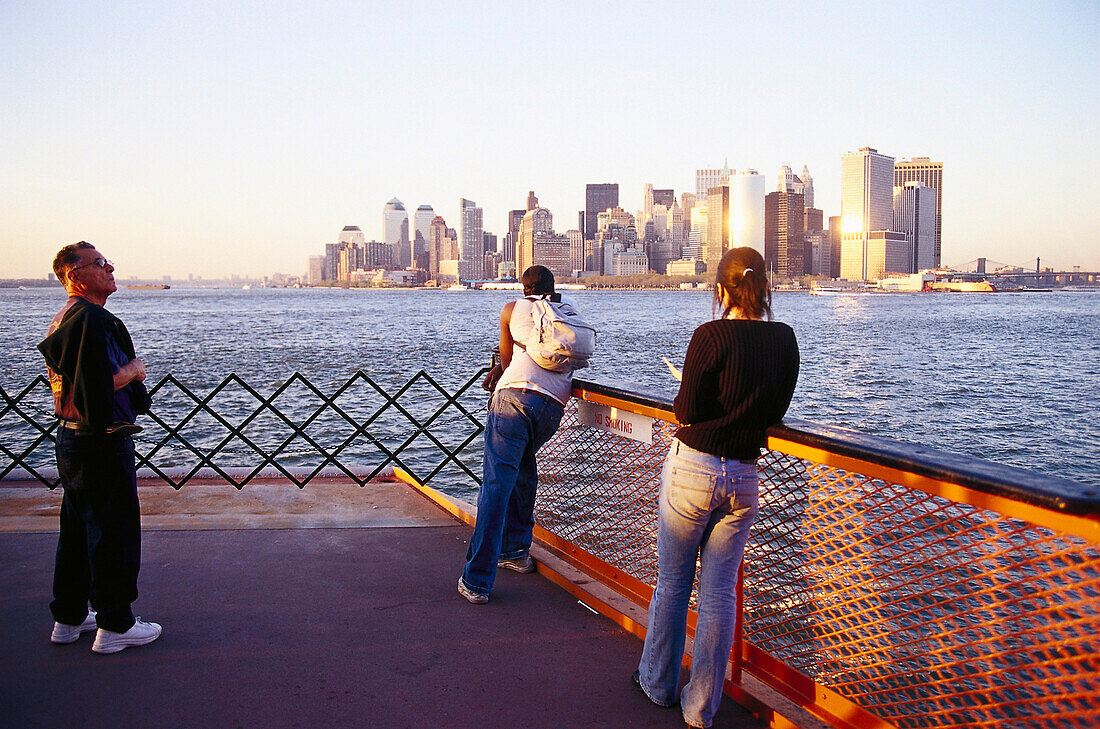 Passengers on Staten Island Ferry, Downtown Manhatten New York, USA
