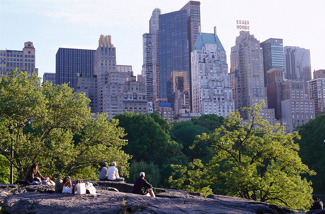 People at Central Park in front of high rise buildings, Manhattan, New York, USA, America