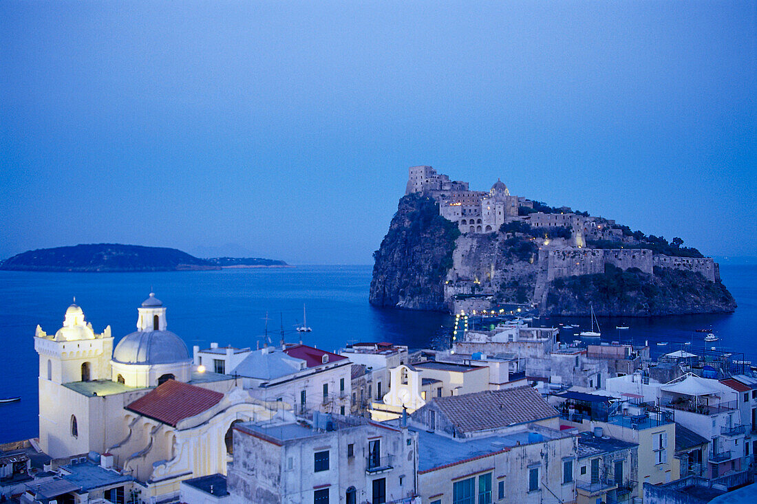 Houses of the Ponte district and the Castello Aragonese in the evening, Ischia, Campania, Italy, Europe