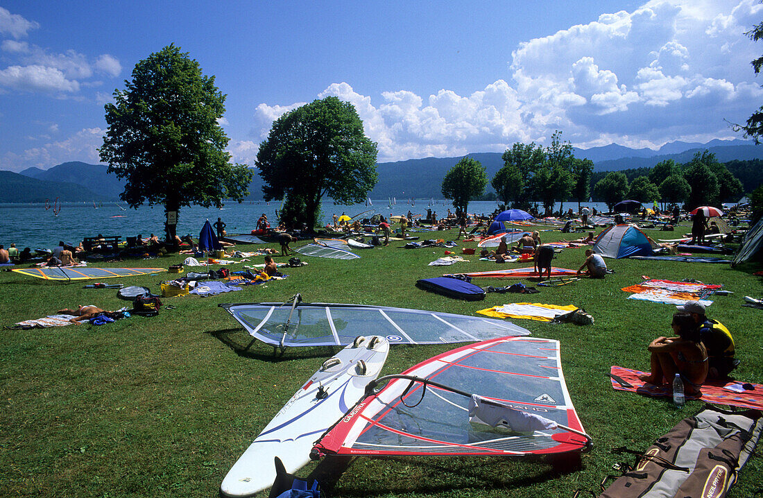 People and sailboards at the banks of Walchensee, Bavaria, Germany, Europe