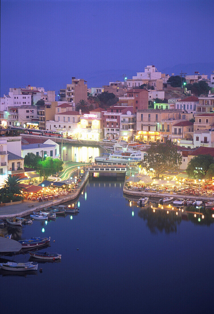 Agíos Nikolaos at Voulismeni Lake in the evening, Crete, Greece