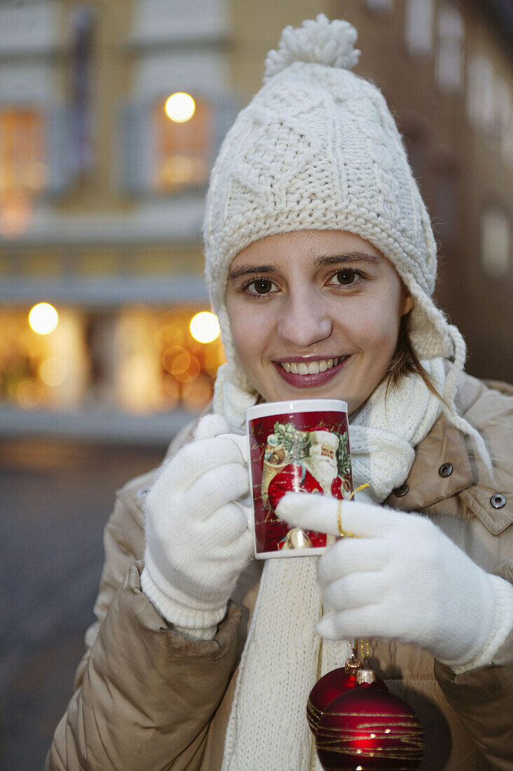 Girl with cap drinking tea at christmas-time, Christmas Weihnachten Coldness Winter