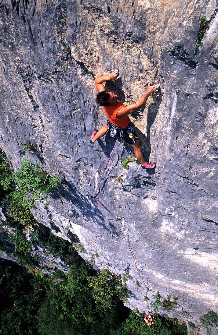 Man climbing up Mia Rabbia, Alpine climbing, Monte Cimo, Trentino, Italy