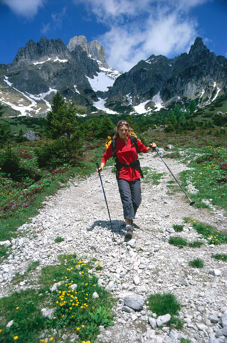 Young woman hiking , Gosaukamm, Salzburger Land, Austria