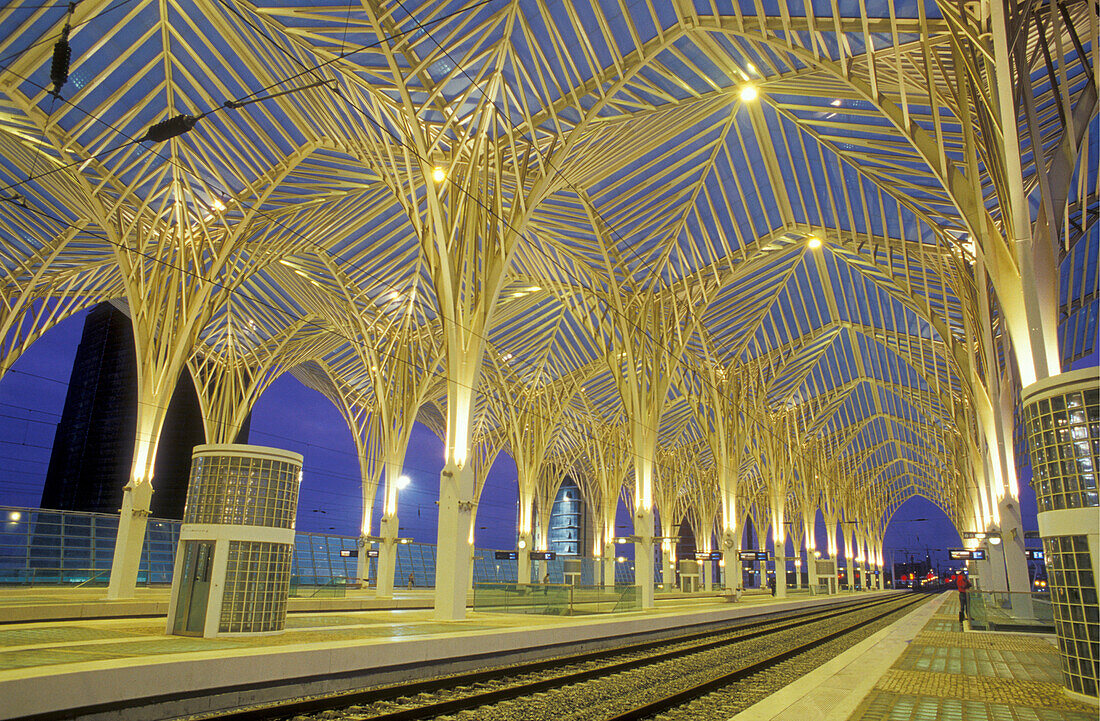 Illuminated, deserted railway station in the evening, Gare do Oriente, Parc de Nacoes, Lisbon, Portugal