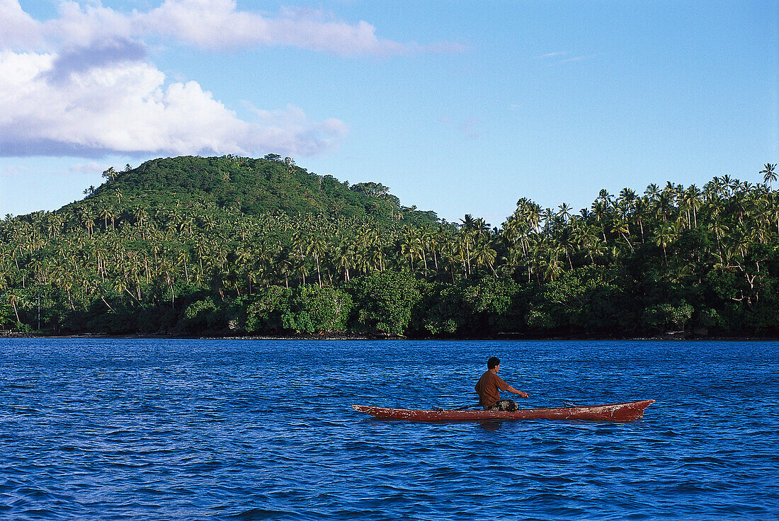 Fisherman in canoe, near Manono Island near Upolu, Samoa