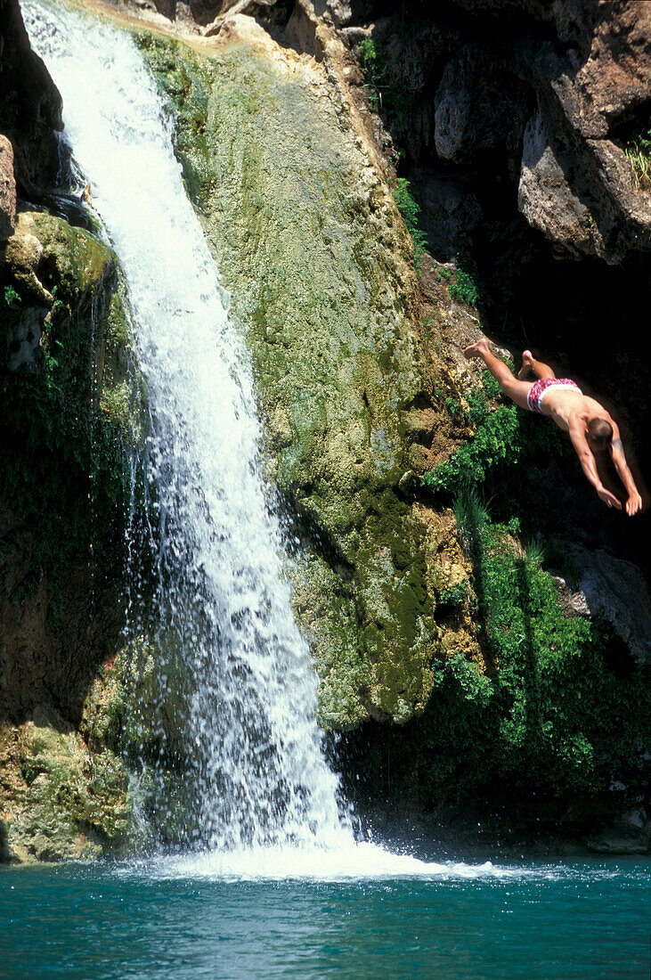 Man, Waterfall, Os Moinhos da Rocha Tavira, Algarve, Portugal