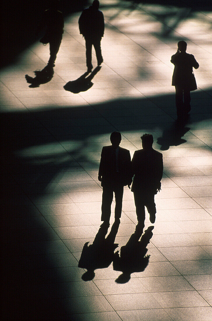 People walking on sidewalk, shadows, Tokyo, Japan