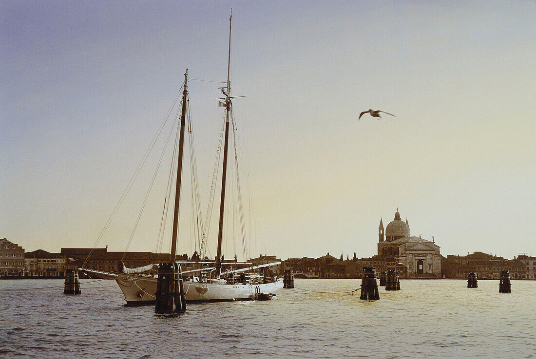 Donna Leon, Death at La Fenice, Sailing boat in the bay, Guidecca, Redentore church, Venice, Italy