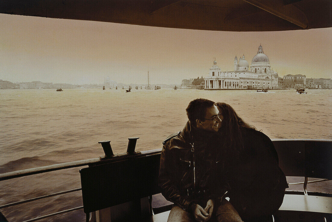 Donna Leon, Death in a Strange Country, Couple on a Vaporetto, Church Chiesa Santa Maria della Salute in the background, Venice, Italy