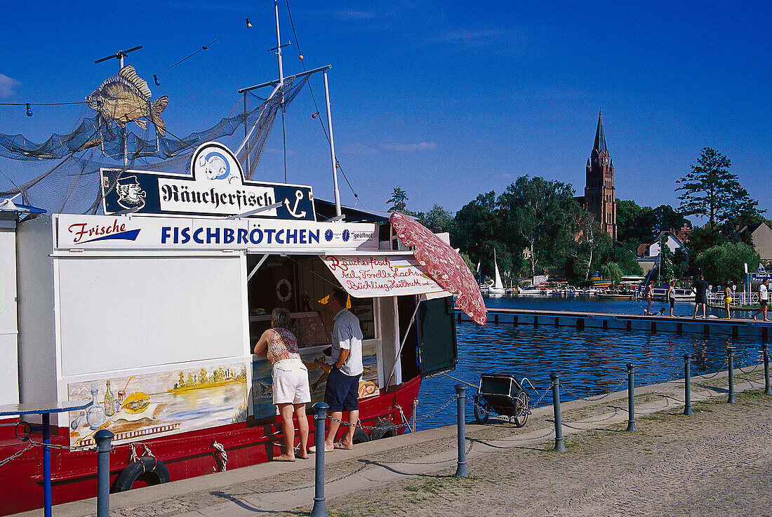 Fishmonger selling fish rolls, Roebel, Mecklenburg Lake district, Mecklenburg-Vorpommern, Germany