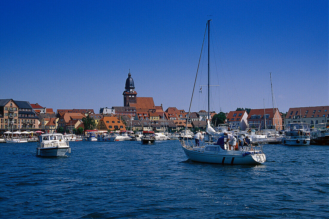 Boats in the harbour, Lake Mueritz, Mecklenburg lake district, Mecklenburg-Vorpommern, Germany