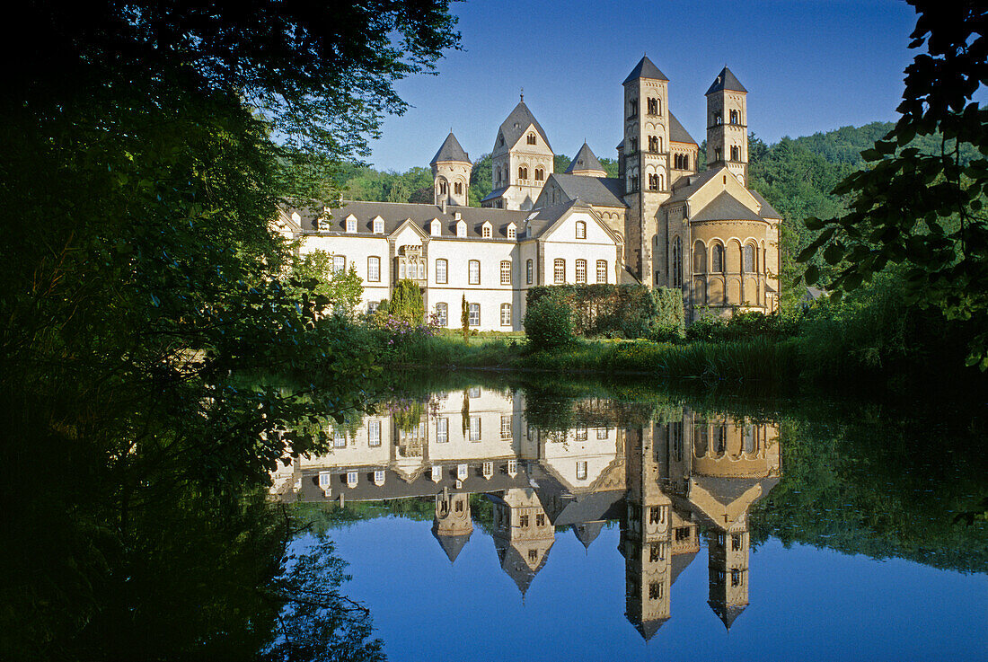 View of Maria Laach Abbey and reflection, Eifel, Rhineland Palatinate, Germany