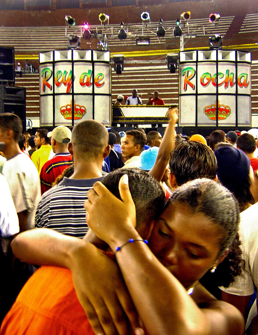 Dancing people at a stadium in the evening, Rey de Rocha, Chawala, Colombia, South America