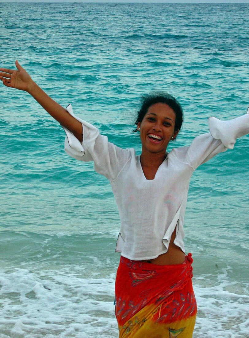 Cheerful young woman on the beach, Carribbean Beach, Colombia, South America