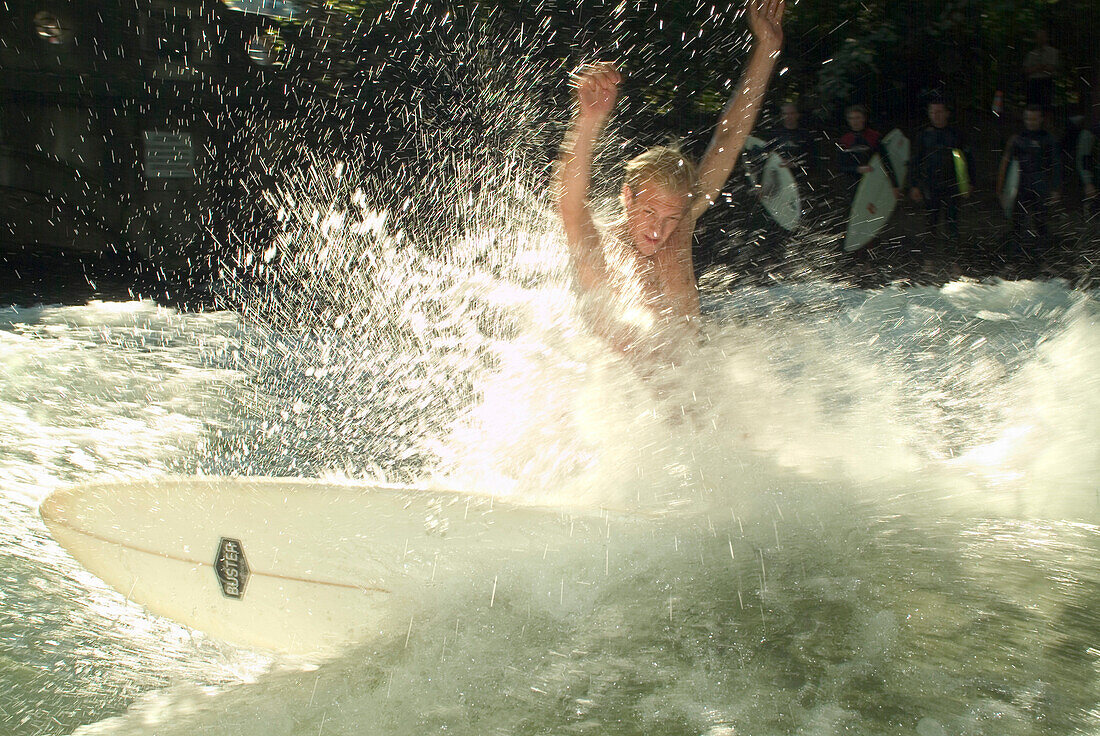 Surfer at Eisbach, small artificial river, English Garden, Munich, Bavaria, Germany