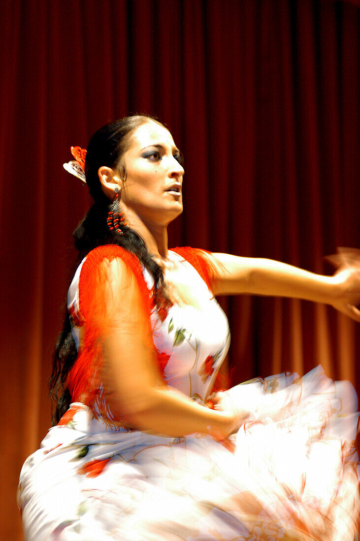 A woman dancing Flamenco, World Flamenco Fair, Seville, Andalucia, Spain