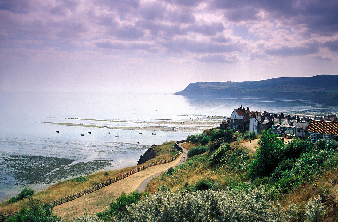 View at coast area under clouded sky, Robin Hood's Bay, Yorkshire, England, Great Britain, Europe