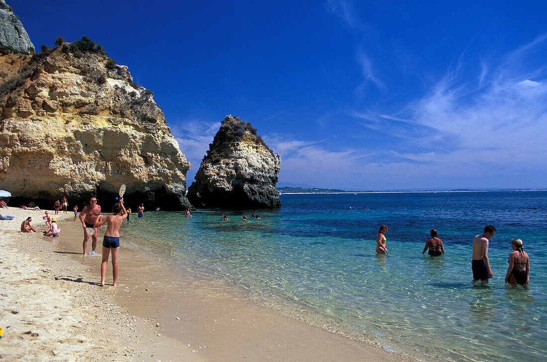 People on the beach, Praio do Camilo, Lagos, Algarve, Portugal, Europe