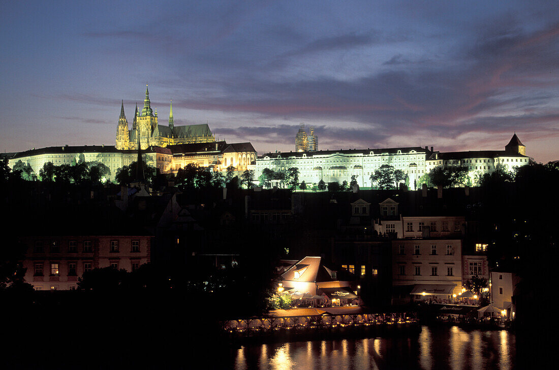 The illuminated Prague Castle in the evening, Hradcany, Prague, Czechia, Europe