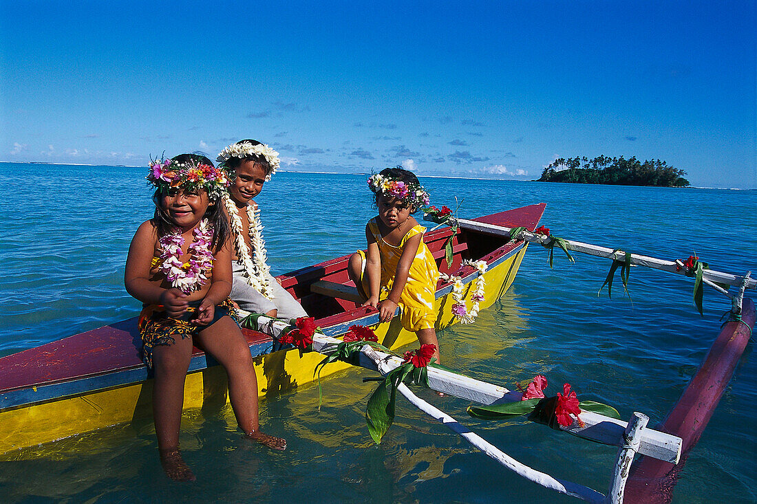 Flower Children on Canoe, Muri Beach Rarotonga, Cook Islands