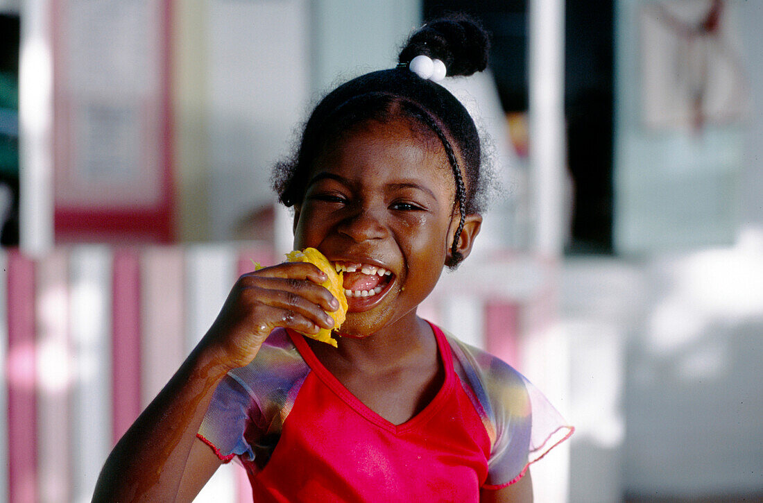 Girl with Mango, Port Elizabeth, Bequia St. Vincent & The Grenadines