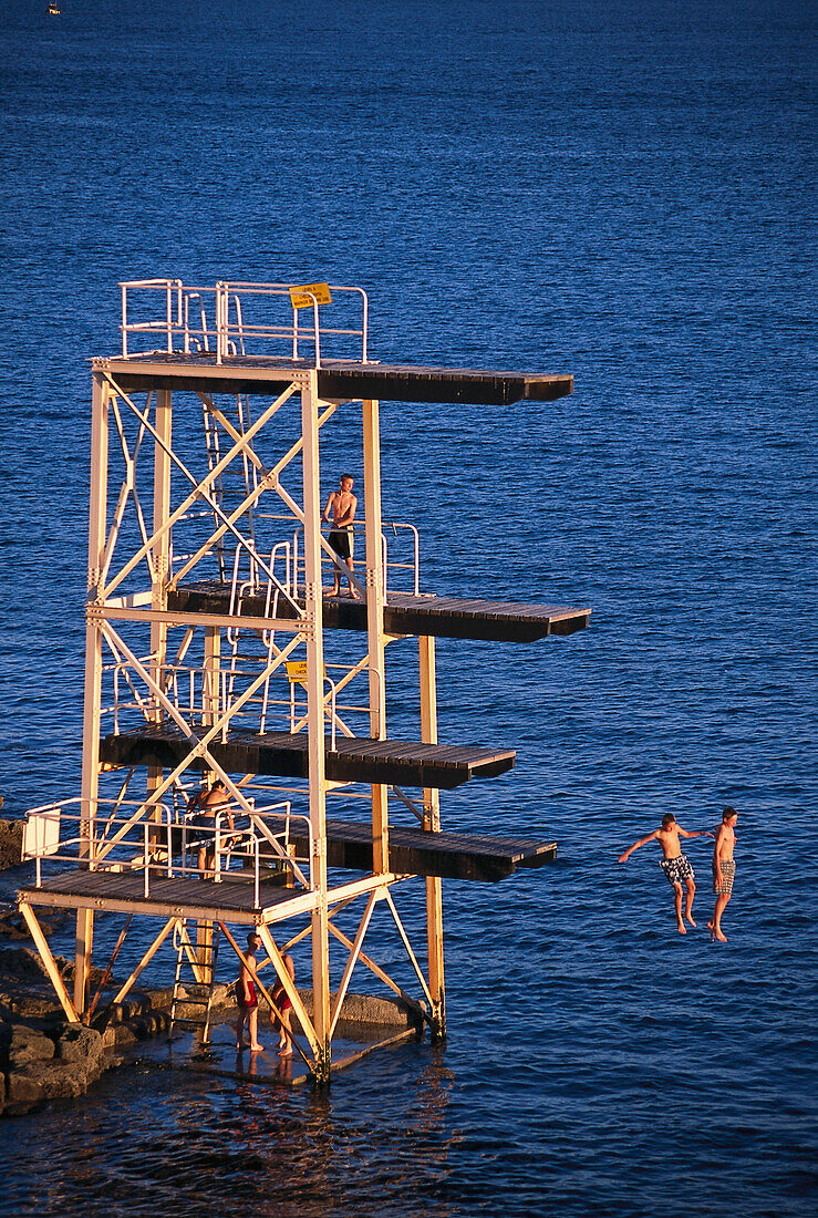 Jumping into Plymouth Sound, Plymouth, Devon, England