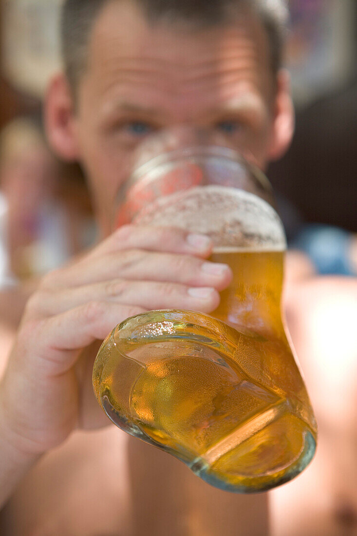 Man Drinking Beer Boot, Old Town, Rhodes, Dodecanese Islands, Greece