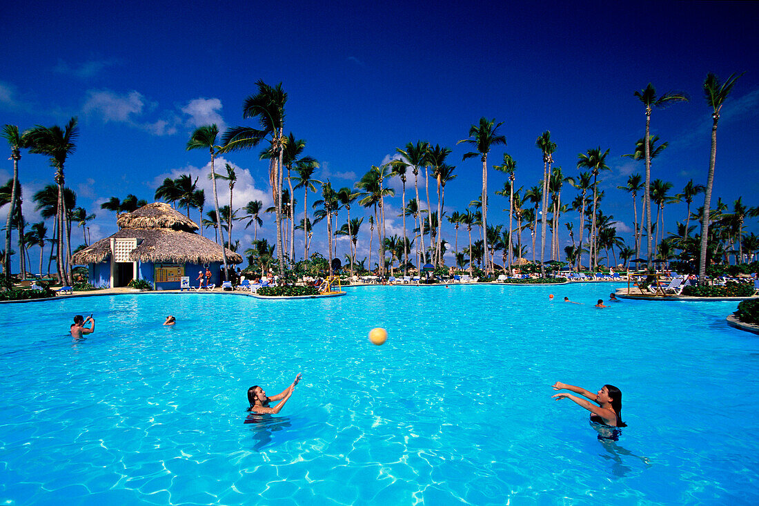 People swimming in a pool at Gran Paradise Resort in Bavaro, Dominican Republic, Antilles, Caribbean