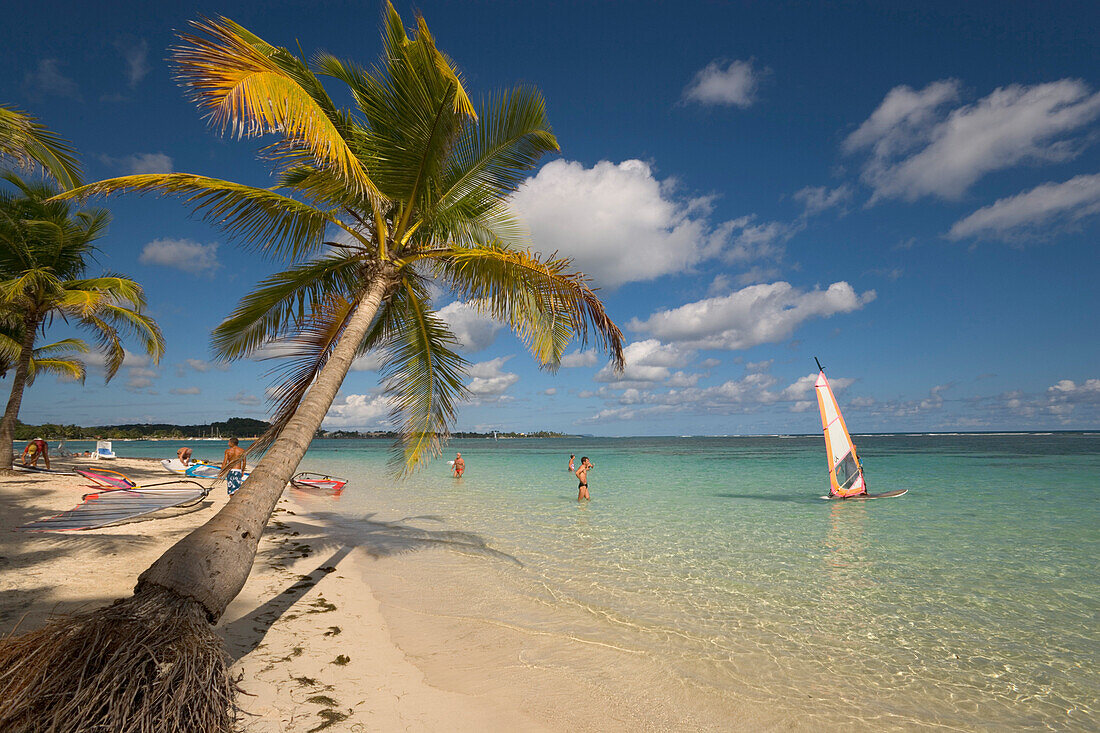 Surfer in front of Caravelle Beach, Club Med, Grande-Terre, Guadeloupe, Caribbean Sea, America