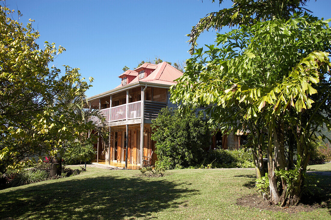 House and garden in the sunlight, Masters House, Cafeiere Beausejour, Pointe-Noire, Basse-Terre, Guadeloupe, Caribbean, America