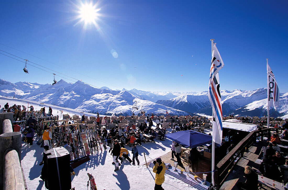 Skiers at ski lodge, Davos, Grisons, Switzerland