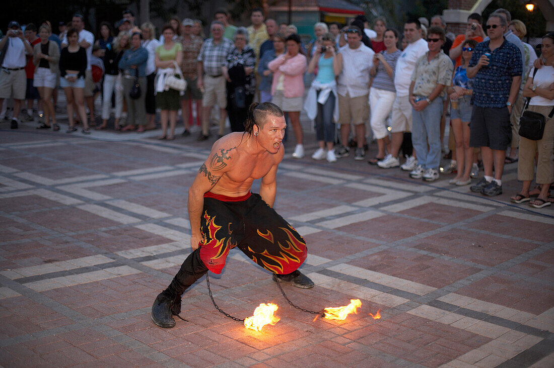 Fire artist at the Daily Sunset Celebrations, Mallory Square, Key West Florida, USA