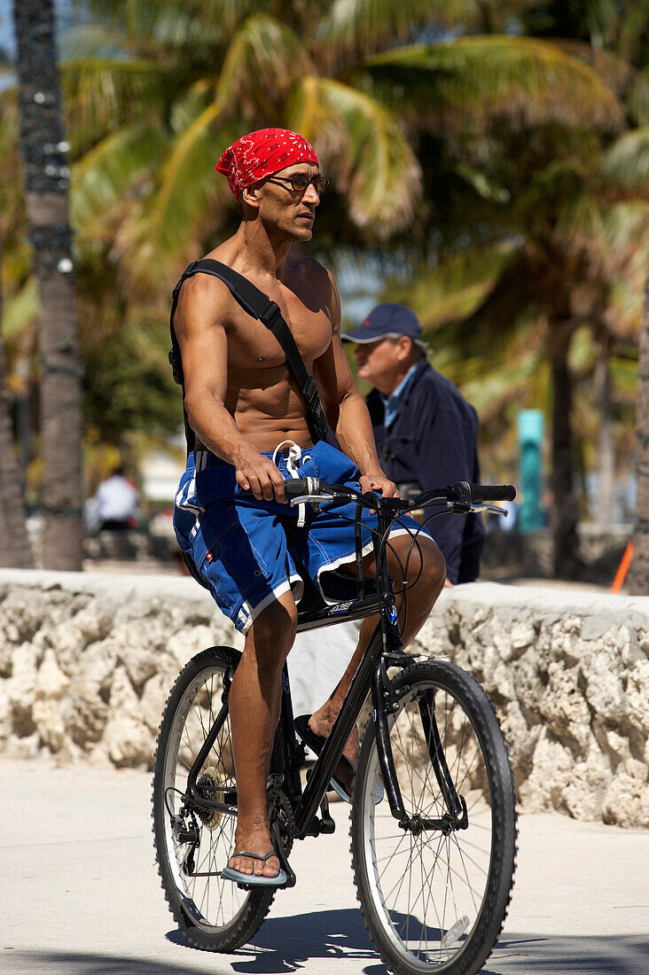 Biker at the promenade of South Beach, Miami, Florida USA