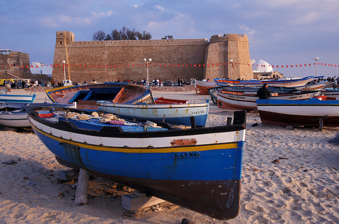Boats on the beach, Kasbah Citadel, Cap Bon peninsula, Hammamet, Tunisia, North Africa, Africa