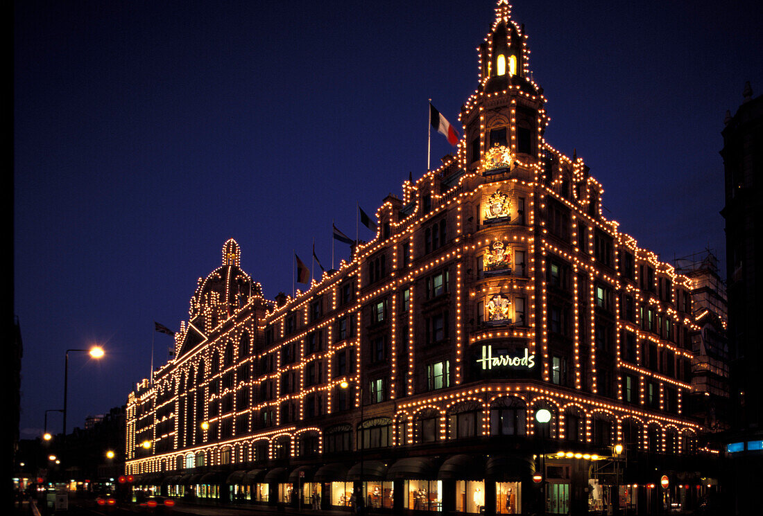 The illuminated department store Harrods at night, London, England, Great Britain, Europe