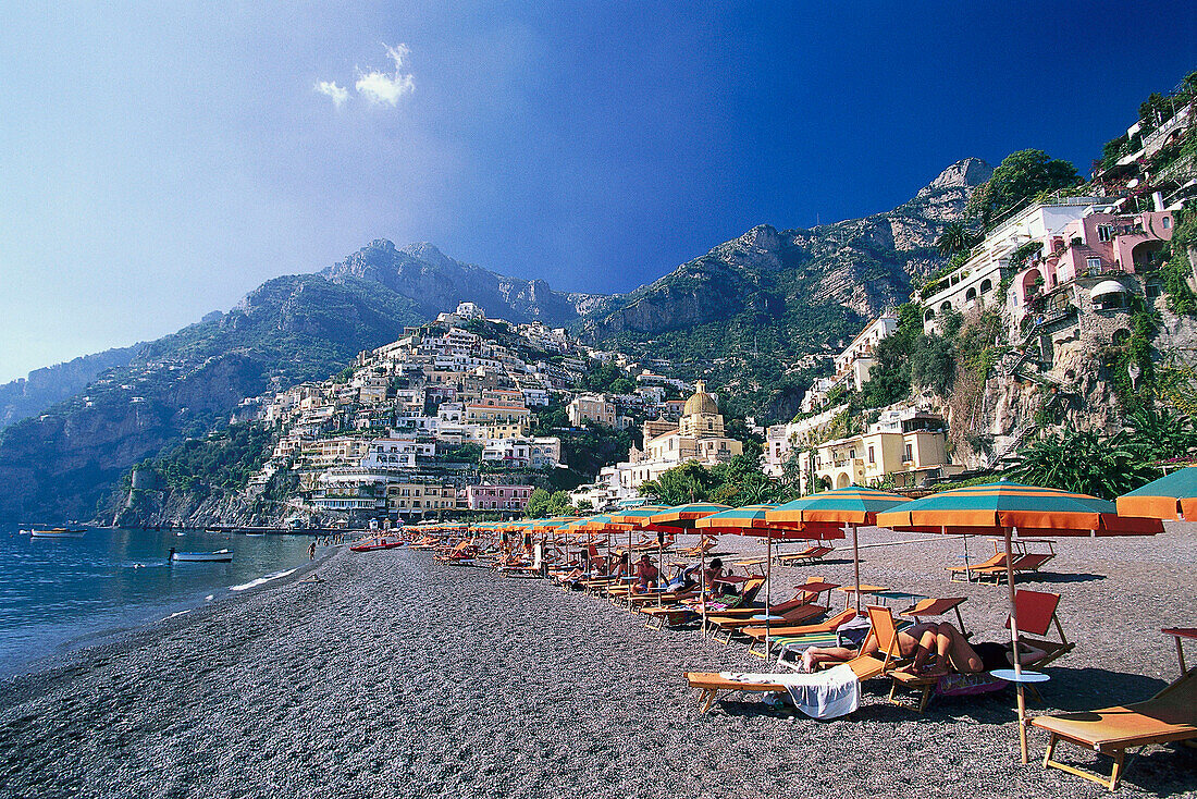 Sun loungers and sunshades on the beach at Positano, Campania, Italy