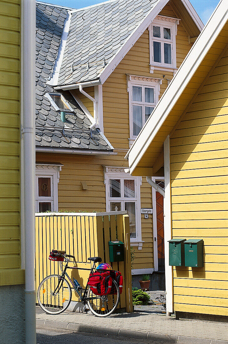 Bike resting against a fence, Cycle tour of Egersund, Rogaland, Norway