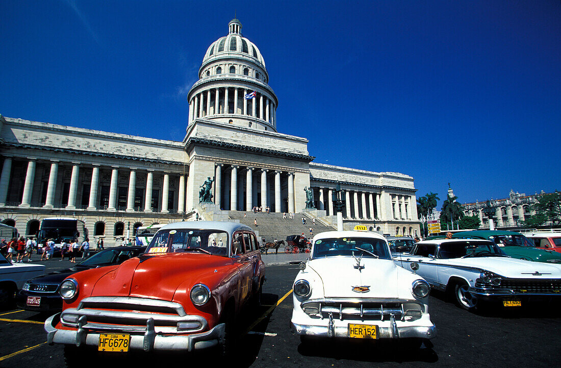 Old taxies in front of Capitolio Nacional at the old town, Havana, Cuba, Caribbean, America