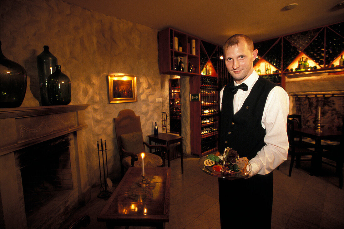 Waiter at restaurant Gloria, Tallinn, Estonia, Europe