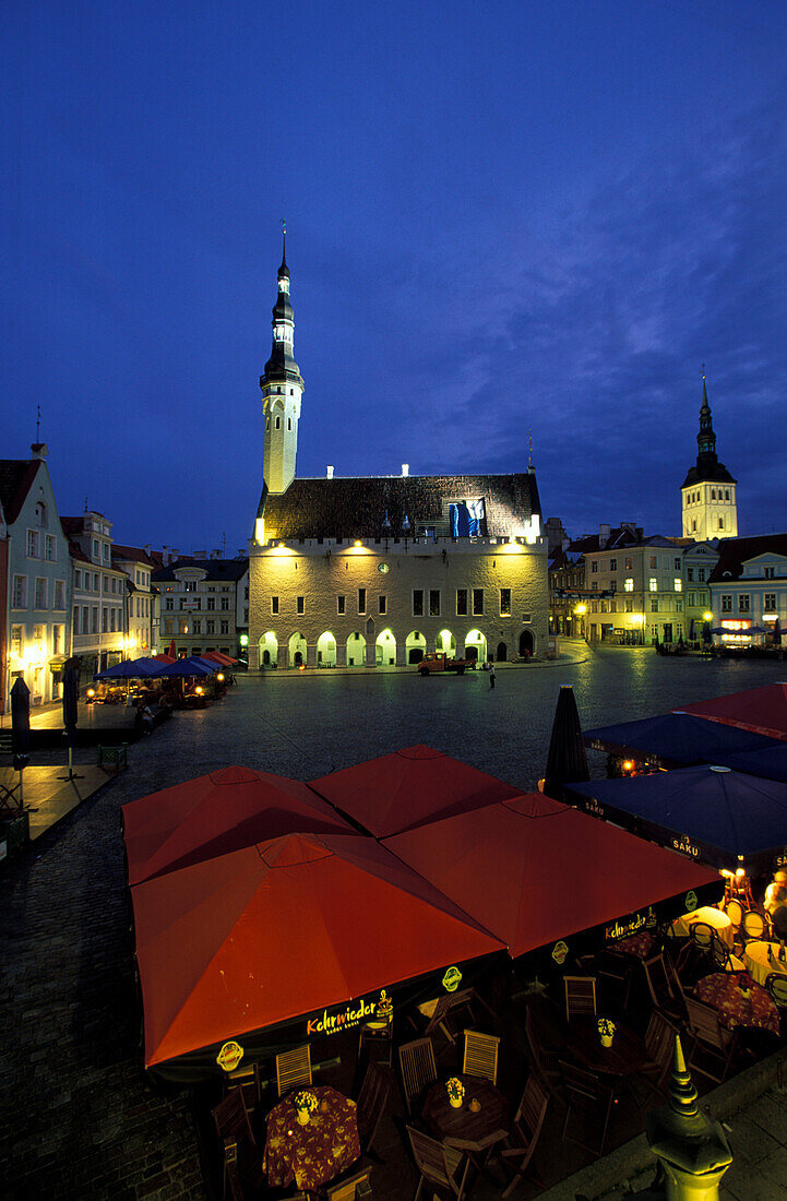 Illuminated buildings at town hall square in the evening, Tallinn, Estonia, Europe