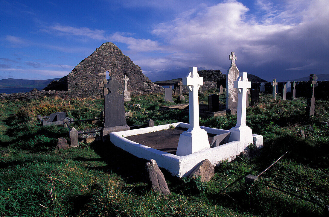 Baile an Scilling cemetery under clouded sky, Ring of Kerry, Kerry, Ireland, Europe