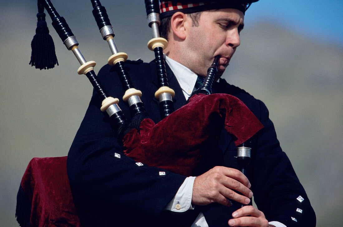 Bagpipe player at Glenfinnan Highland Games, Glen Coe valley, Invernesshire, Scotland, Great Britain, Europe