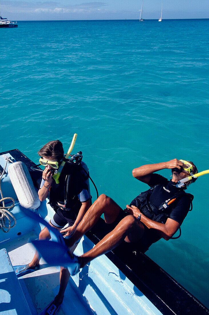 Diver jumping into water, Tobago Caribbean