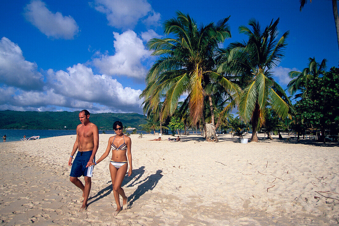 Couple, Beach, Palm Trees, Couple at the beach at Cayo Levantado, Bahia de Samana, Dominican Republic