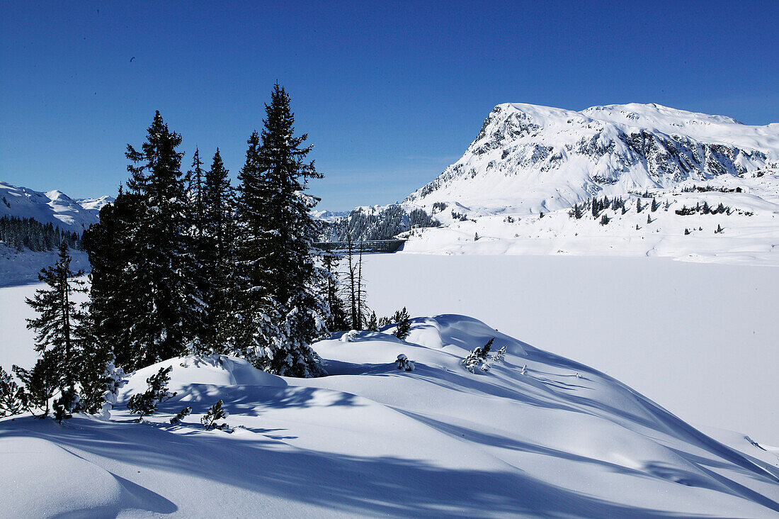 Kops lake, Winter landscape in the mountains, Galtuer, Tyrol, Austria