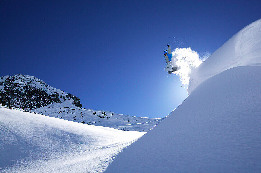 Snowboarder on Alpkogel, Wirl near Galtuer, Tirol, Austria