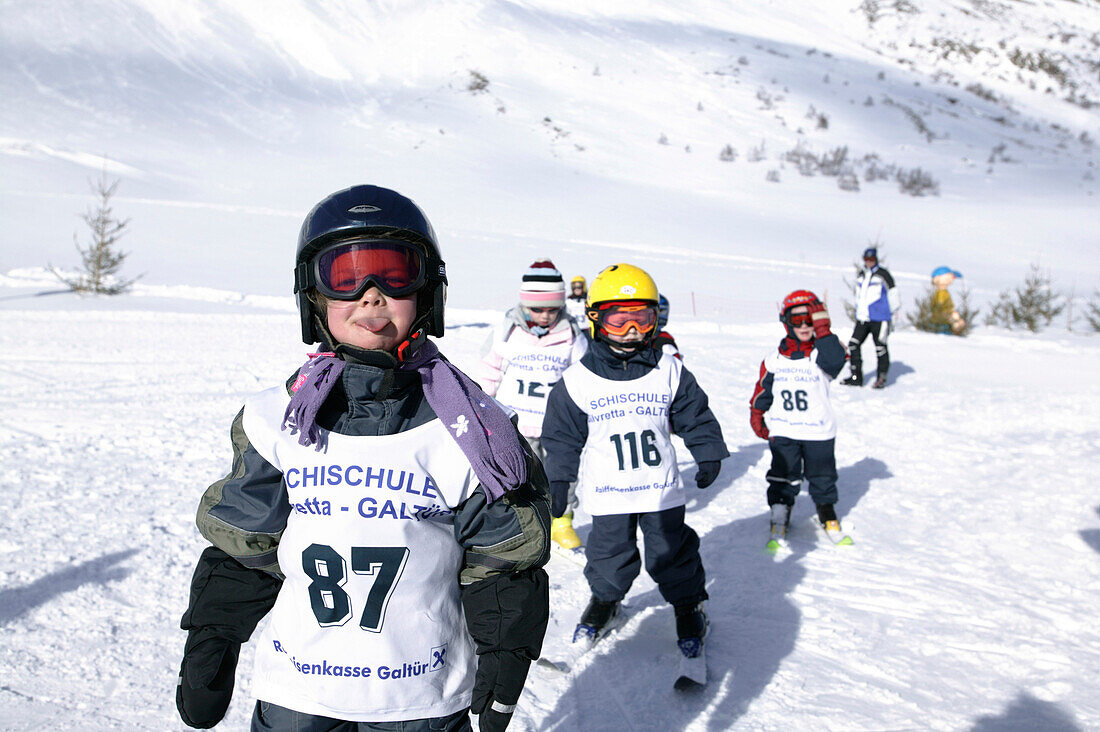 Children at ski race, Wirl near Galtuer, Tirol, Austria