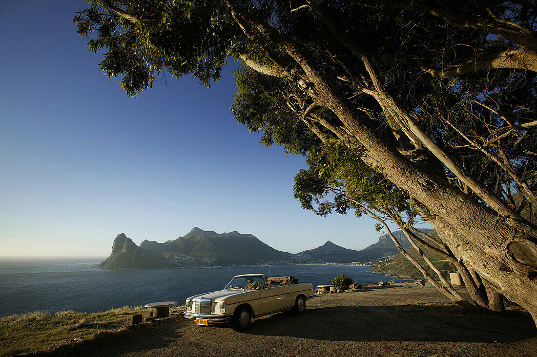 Old Mercedes Benz on viewpoint over Hout Bay, Chapmans Peak Drive from Hout Bay to Noordhoek, Cape peninsula, Western Cape, South Africa